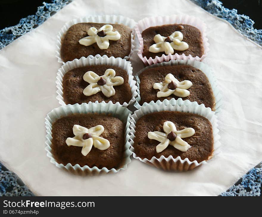 Chocolate Cupcakes Topped With White Frosting Flow