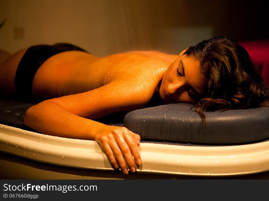 Relaxed woman lying in a spa. Relaxed woman lying in a spa.