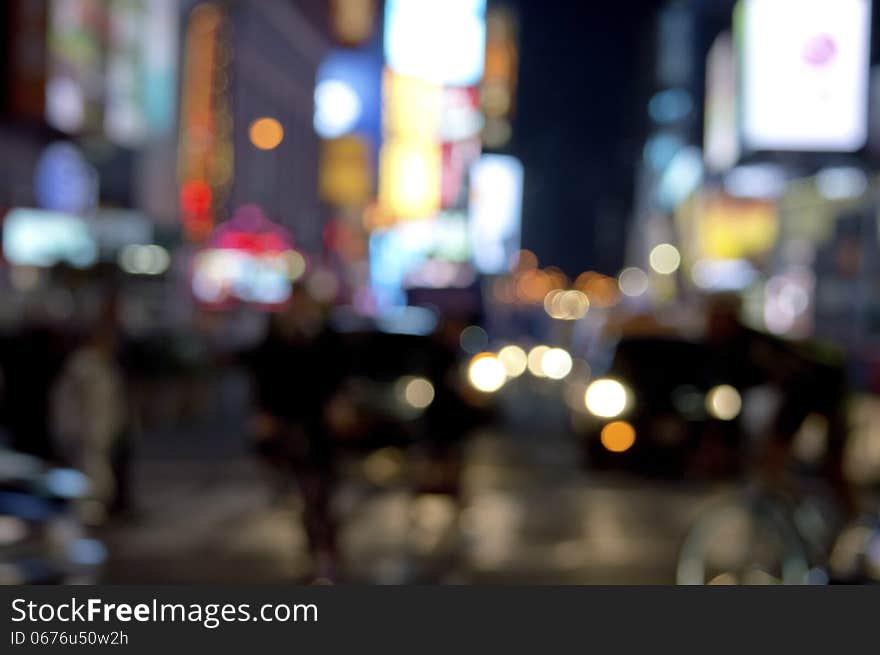 An abstract blur background photo of an intersection in Times Square in Manhattan. An abstract blur background photo of an intersection in Times Square in Manhattan.