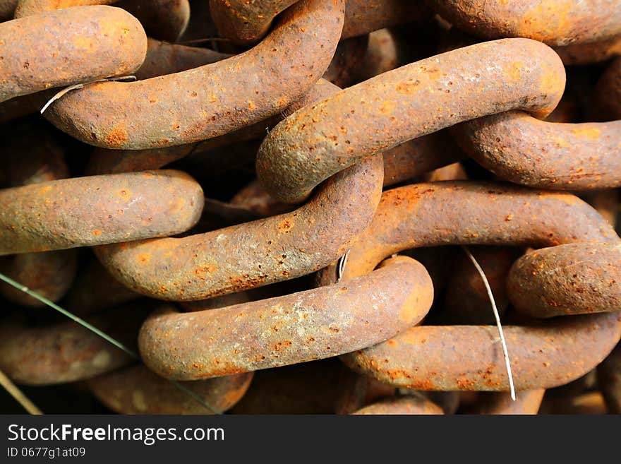 Rusted steel chains as a background. Rusted steel chains as a background