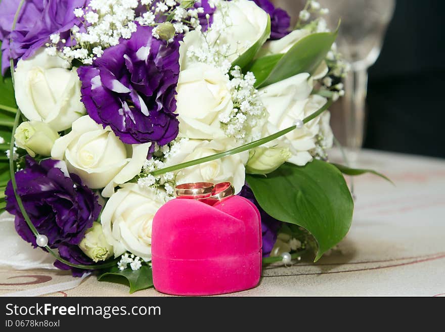 Wedding still life : Wedding rings and flowers