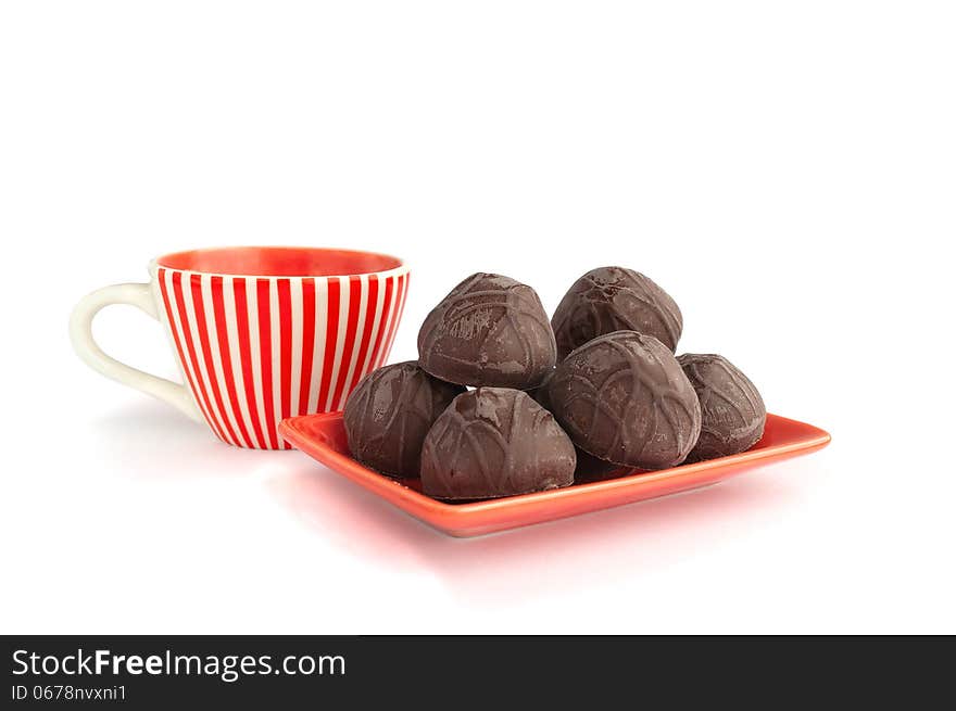 Сhocolate candies with cup of tea