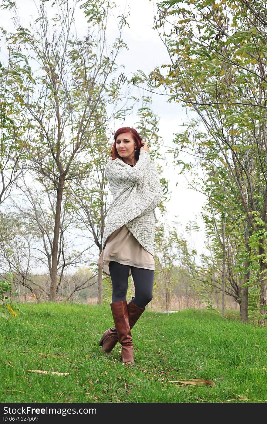 Portrait of the beautiful woman in the forest. Shooting on the nature. Portrait of the beautiful woman in the forest. Shooting on the nature.