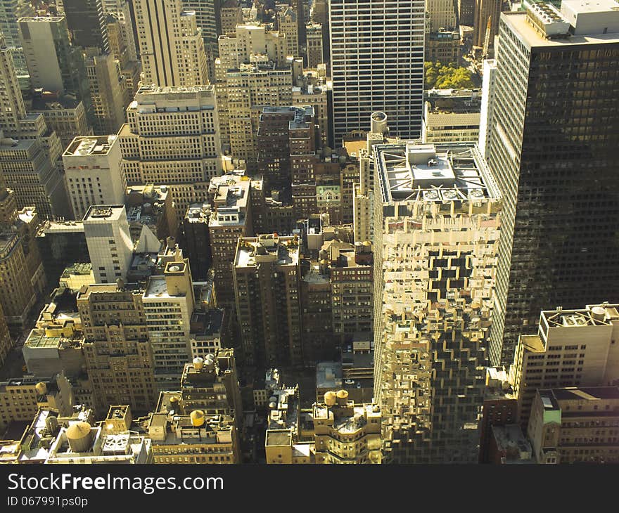 A top view of office building and skyscrapers in New York City. A top view of office building and skyscrapers in New York City