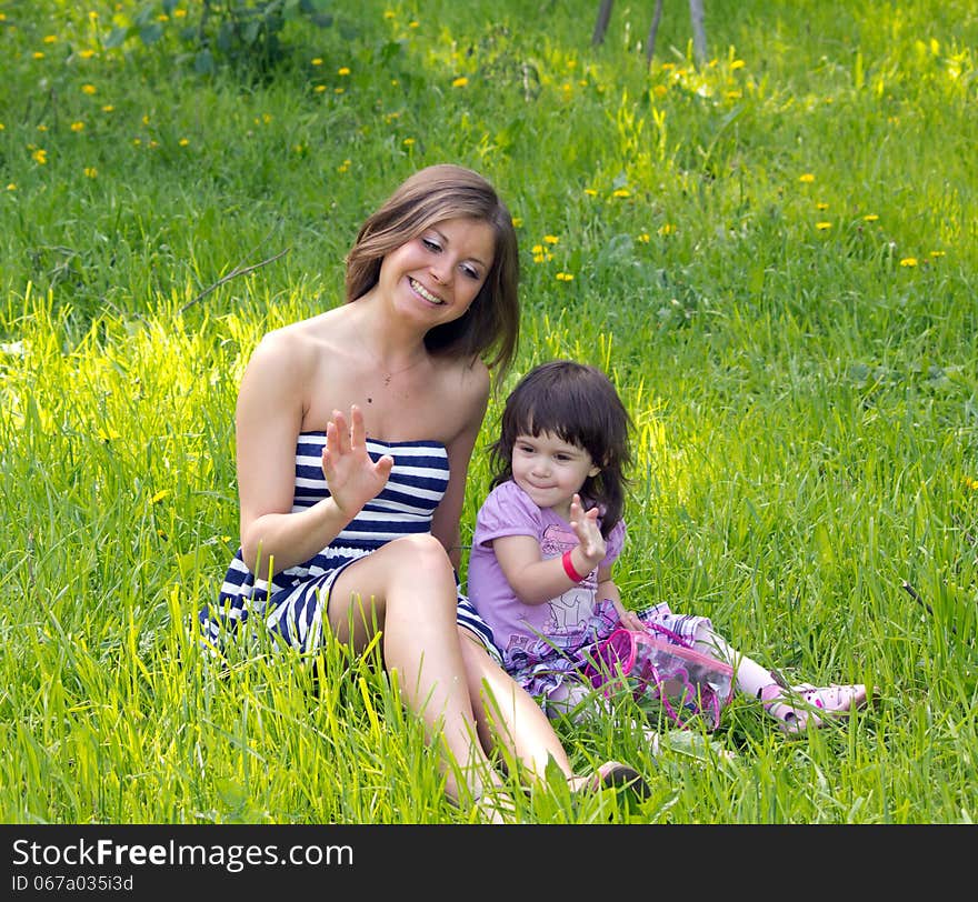 Summer holiday two girls in the meadow. Summer holiday two girls in the meadow