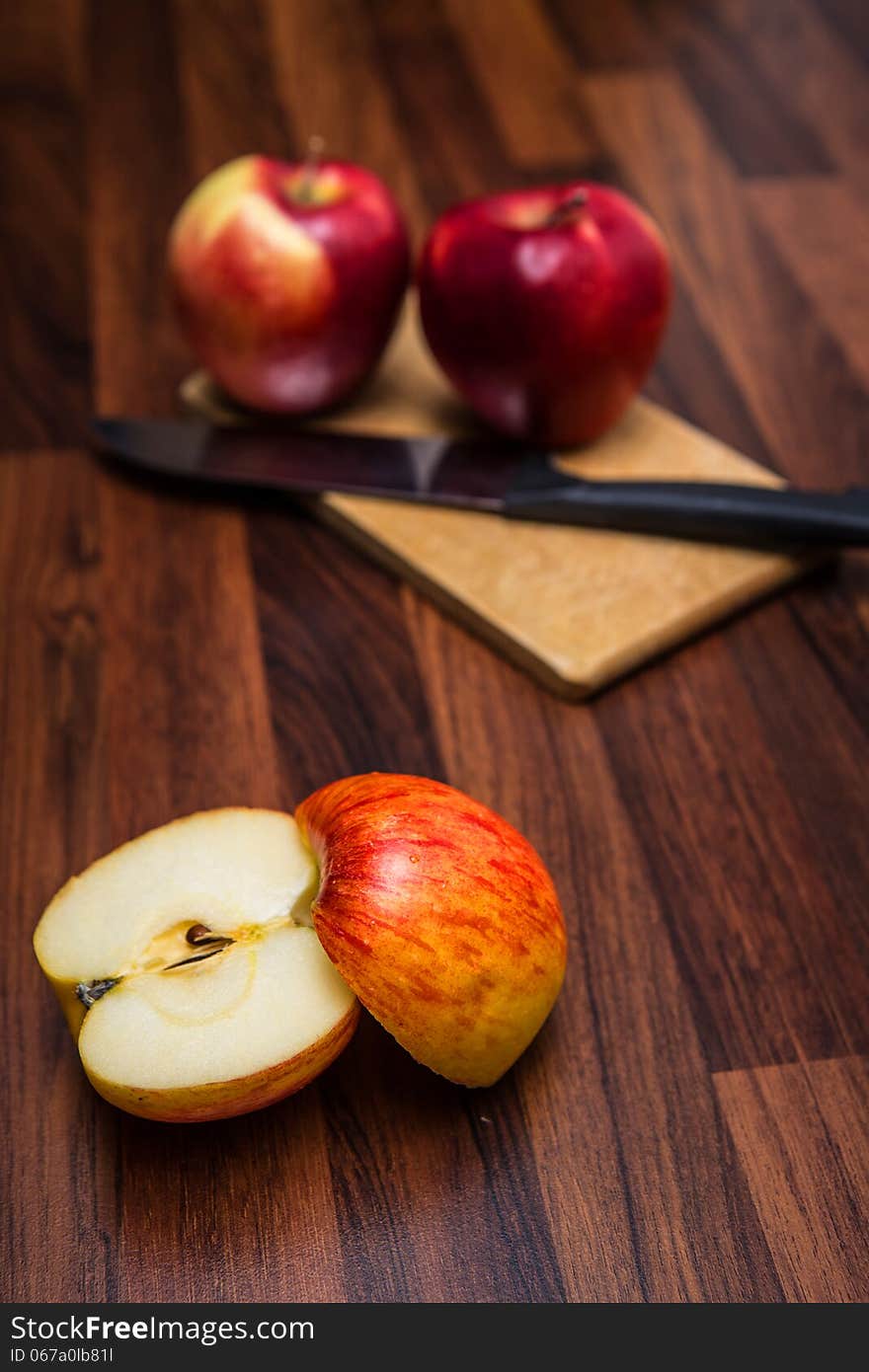 Apples on the line with knife