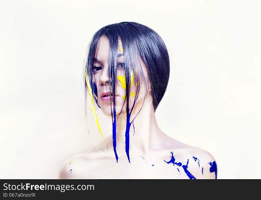 Beauty Face Of Girl Painted Blue And Yellow