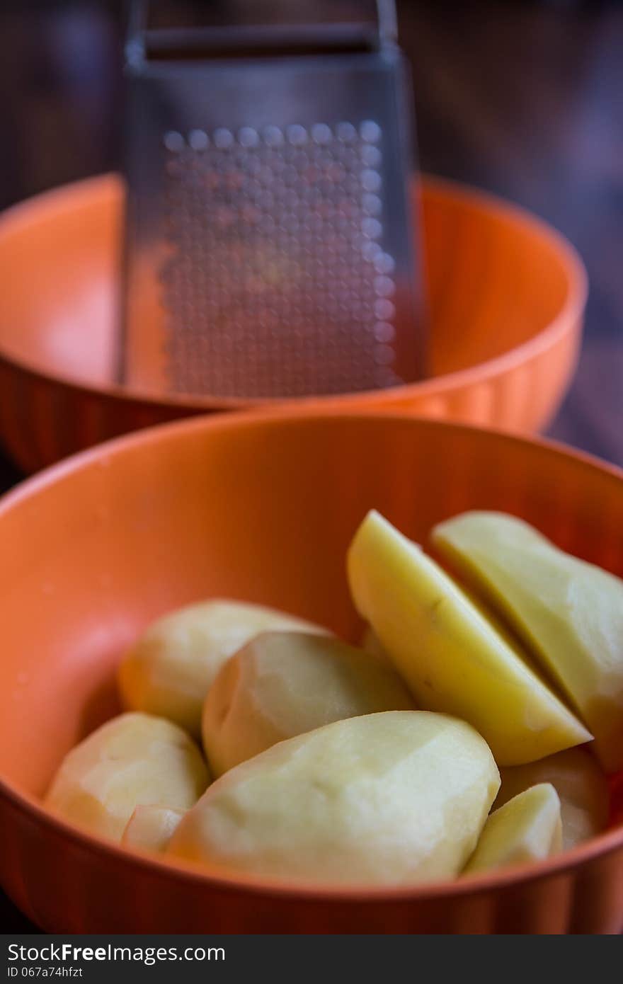 Grated potato peeler on the line in the kitchen. Grated potato peeler on the line in the kitchen