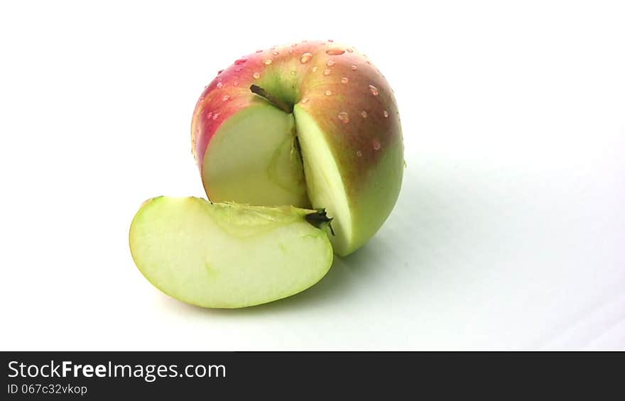 Natural fresh juicy apple with a truncated segment rotates, showing itself on all sides. Natural fresh juicy apple with a truncated segment rotates, showing itself on all sides