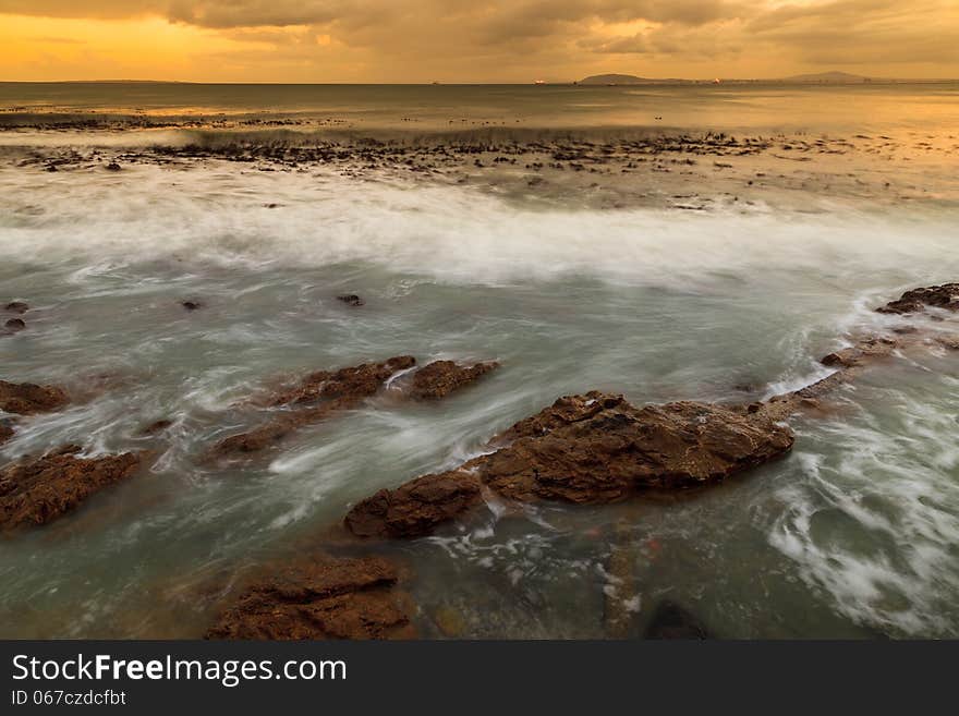 Seascape and wave at dawn in South Africa