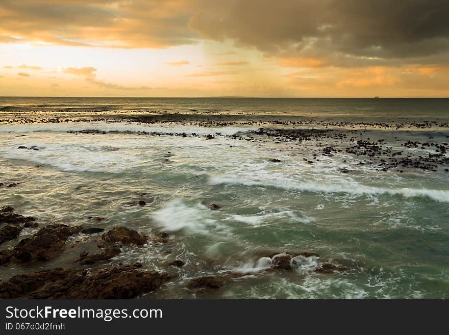 Seascape and wave at dawn in South Africa