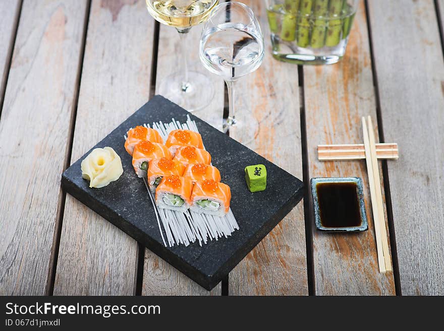 Roll set served on a plate on a table in a restaurant