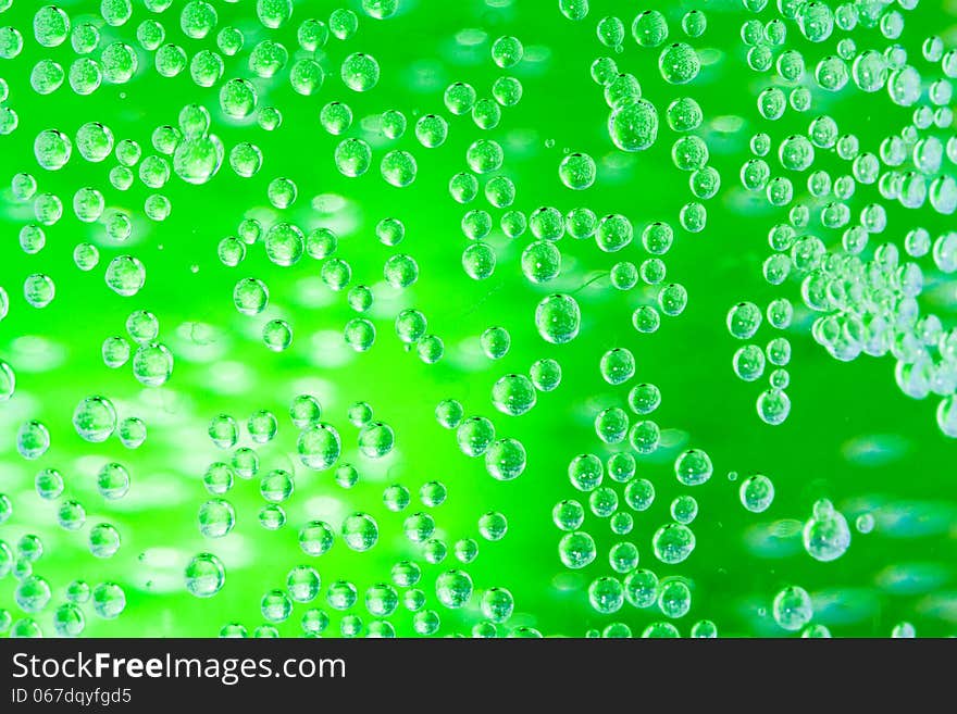 A lot of green drops, abstract background