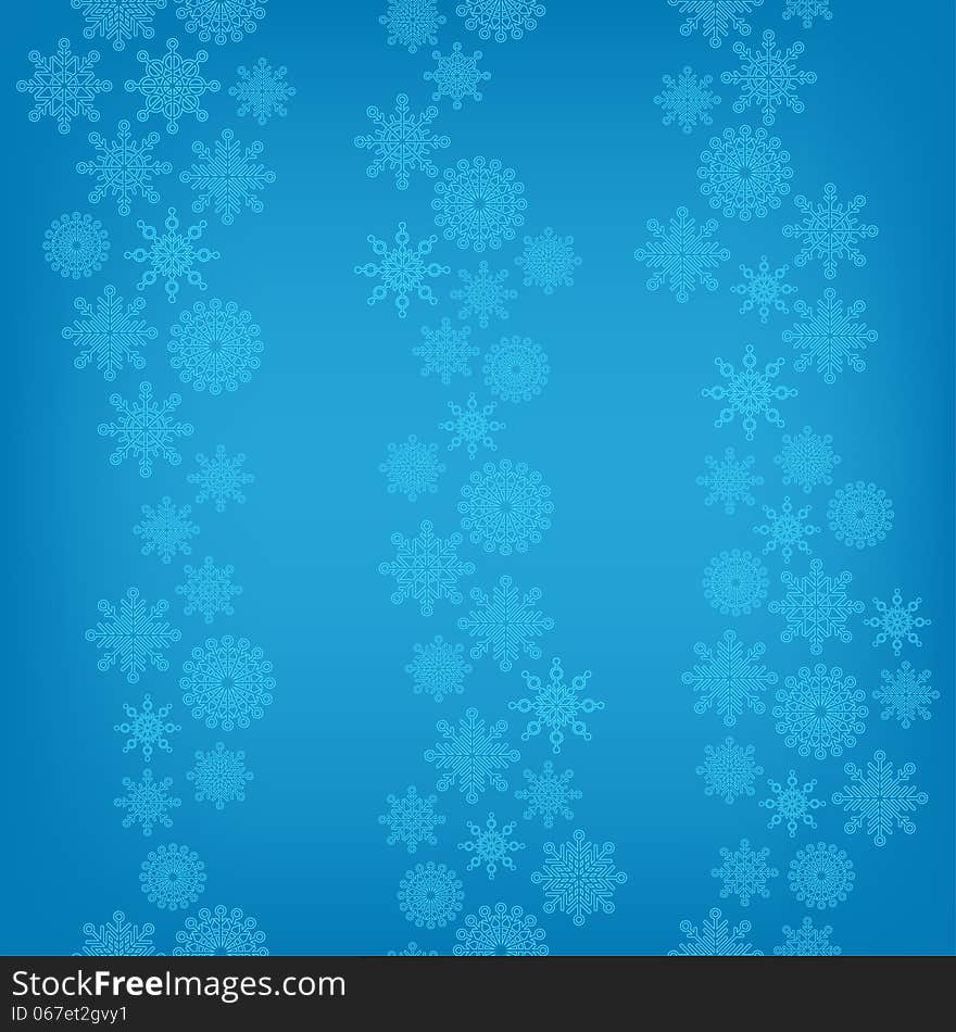 Seamless background of falling snowflakes