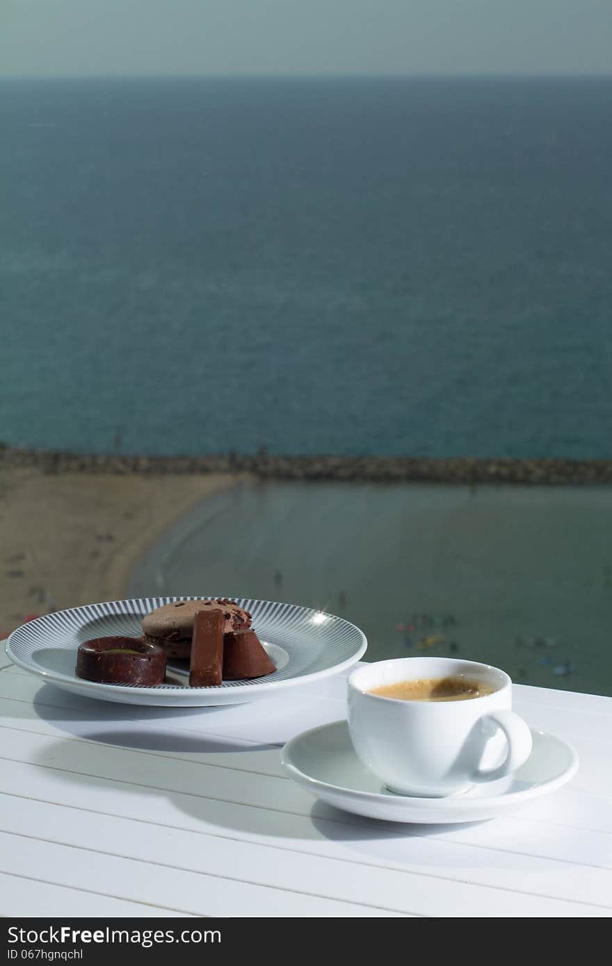 Morning coffee with view to the beach