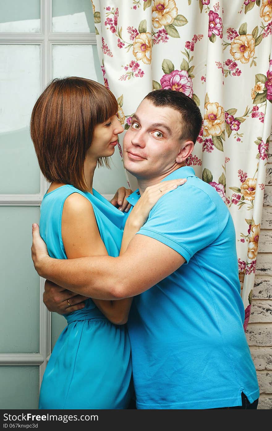 Man and women embracing in a studio shot. Man and women embracing in a studio shot