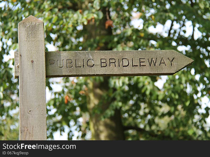 A Public Bridleway Sign on a Countryside Track. A Public Bridleway Sign on a Countryside Track.