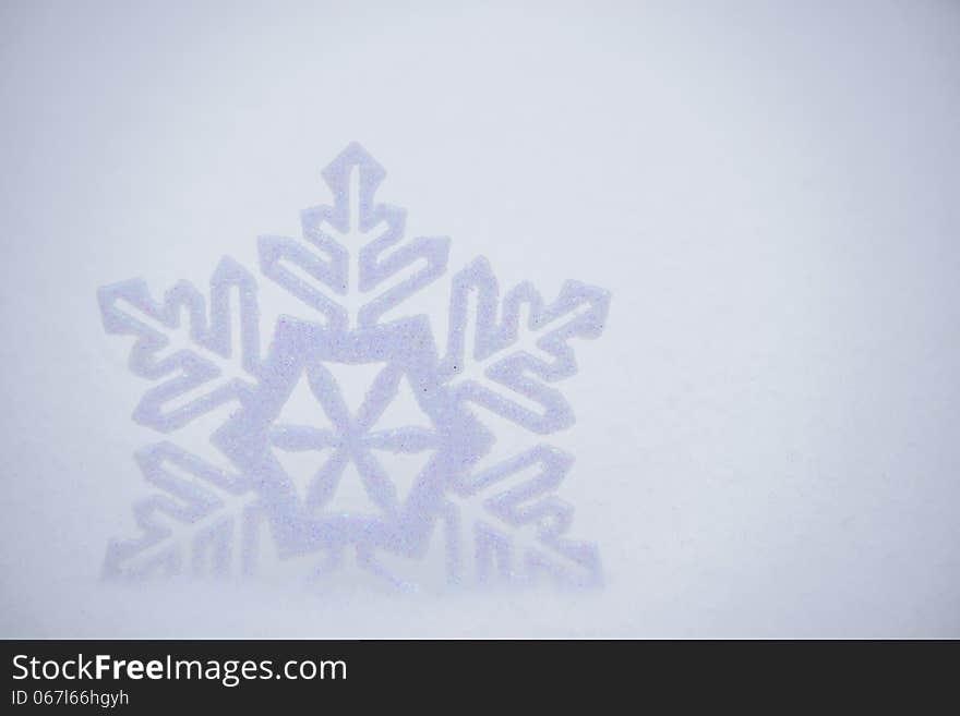 Christmas Background with Beautiful Snowflake on the Snow. Space for Text