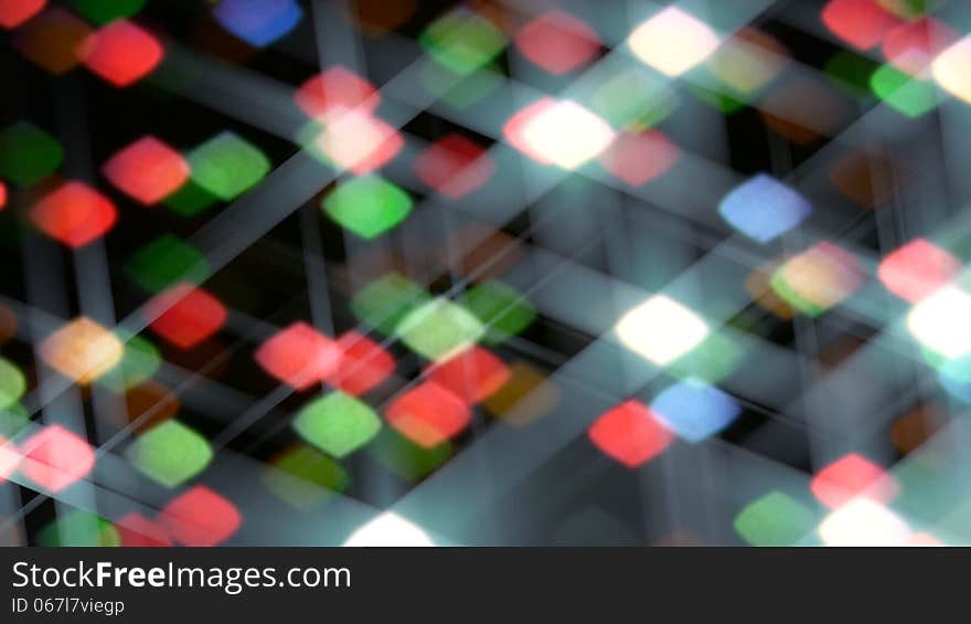 Abstract background of colorful flashing stars on a black background. Abstract background of colorful flashing stars on a black background