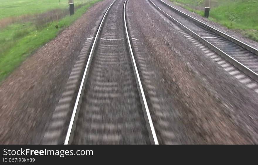 View from the last car of a train. Rails run away. Real sound. View from the last car of a train. Rails run away. Real sound