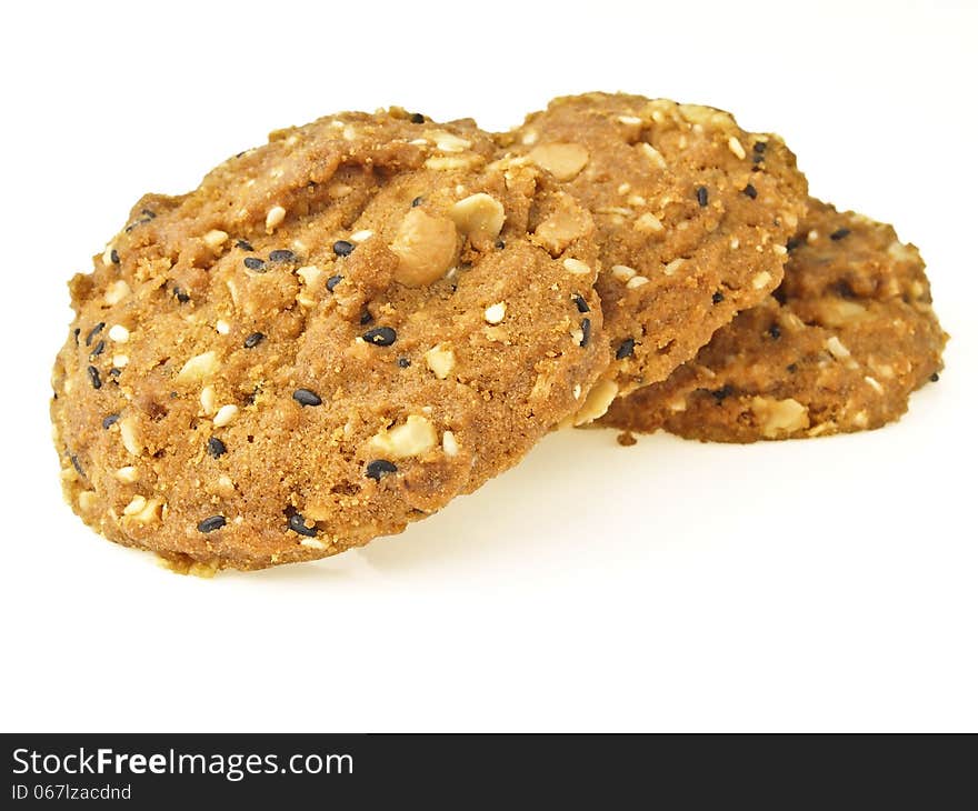 Sequence pile of three whole grains cookies on white background. Sequence pile of three whole grains cookies on white background