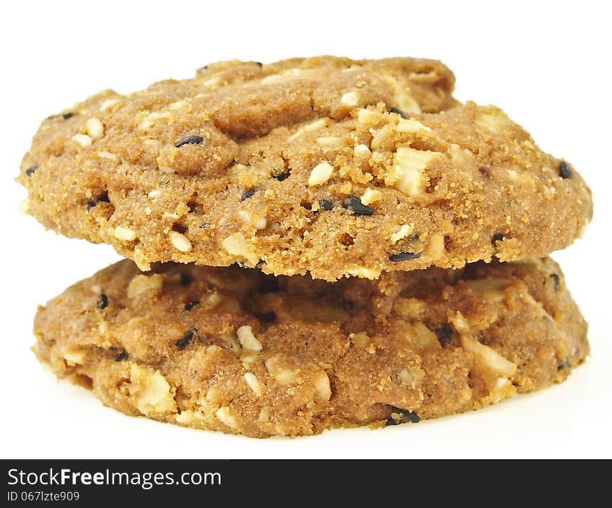 Double stack of whole grains cookies on white background. Double stack of whole grains cookies on white background