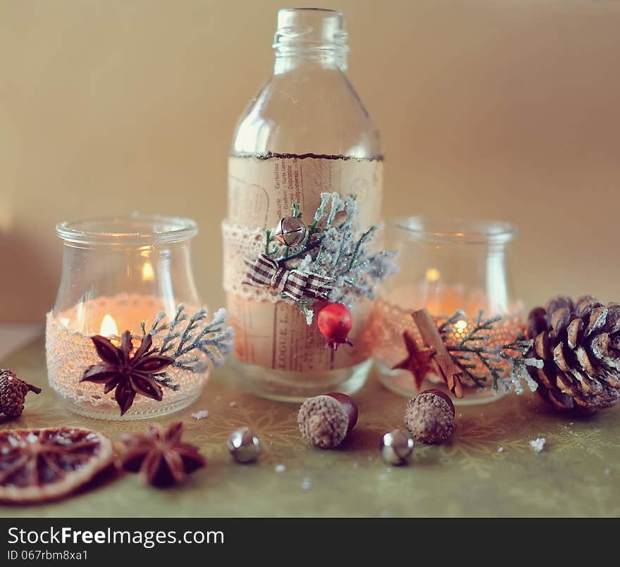 New Year's still life beautiful glass bottles with fire and miscellaneous items. New Year's still life beautiful glass bottles with fire and miscellaneous items