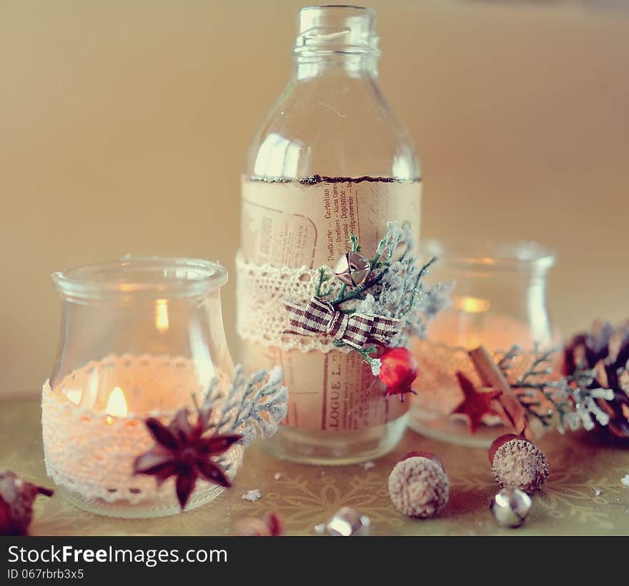 New Year's still life beautiful glass bottles with fire and miscellaneous items. New Year's still life beautiful glass bottles with fire and miscellaneous items