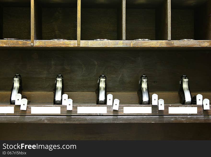 Guns and magazines standing by on arm-rack. Guns and magazines standing by on arm-rack