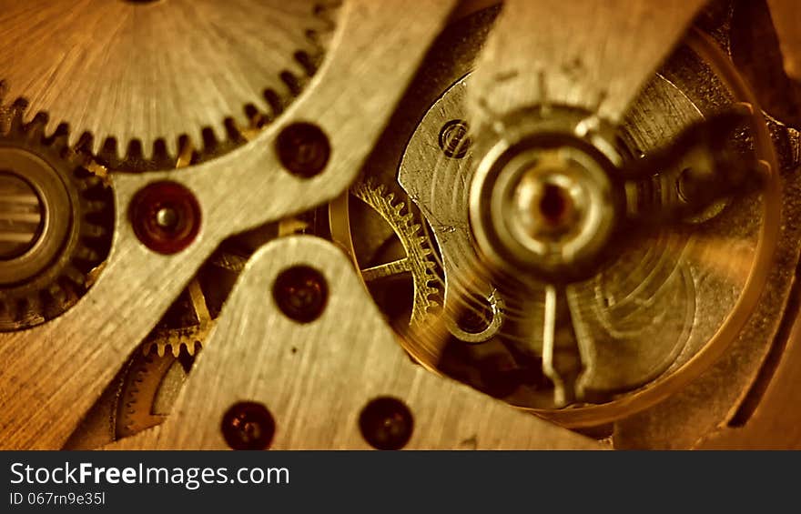 The mechanism of old watches. Close-up. Middle focus