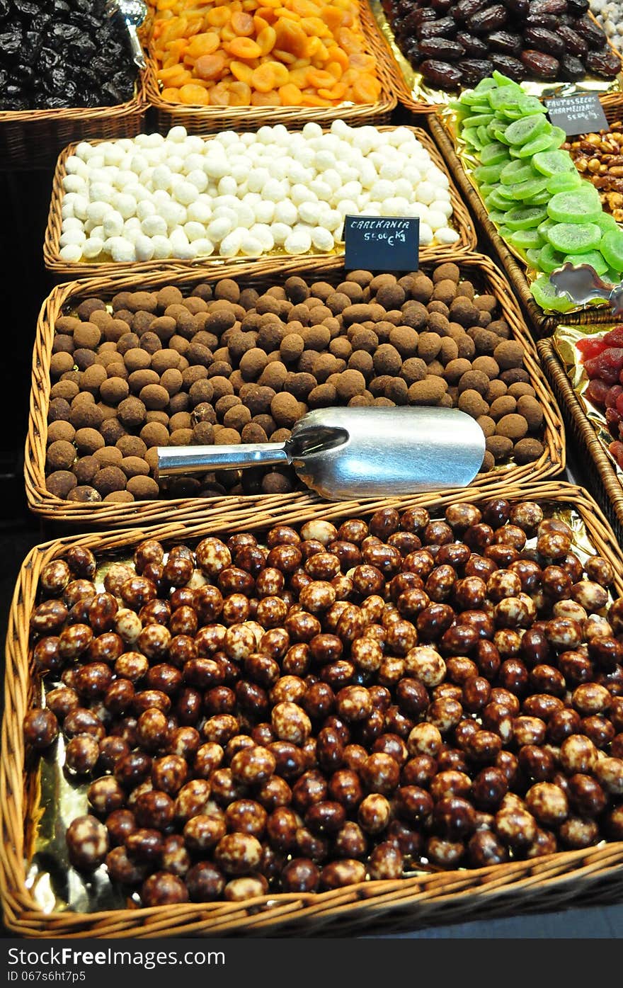 Dried fruits displayed for sale in the market. Dried fruits displayed for sale in the market.