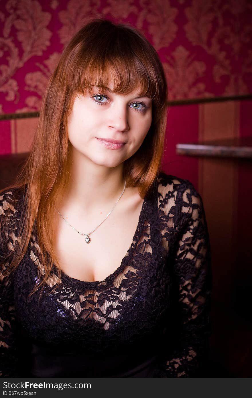 Portrait of young pretty woman in fashionable black dress. Portrait of young pretty woman in fashionable black dress.