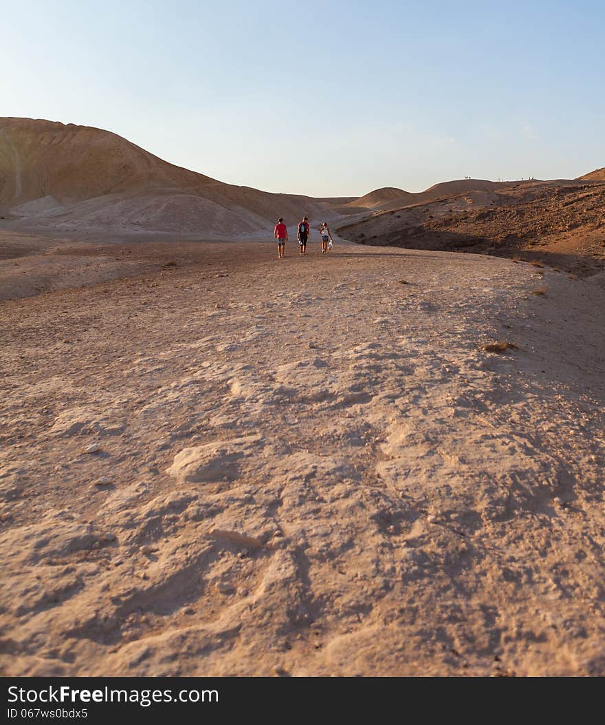 Joint active walk through the desert summer day