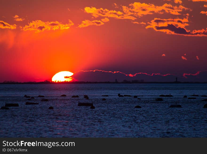 The sun goes down in the bay of Trieste. The sun goes down in the bay of Trieste