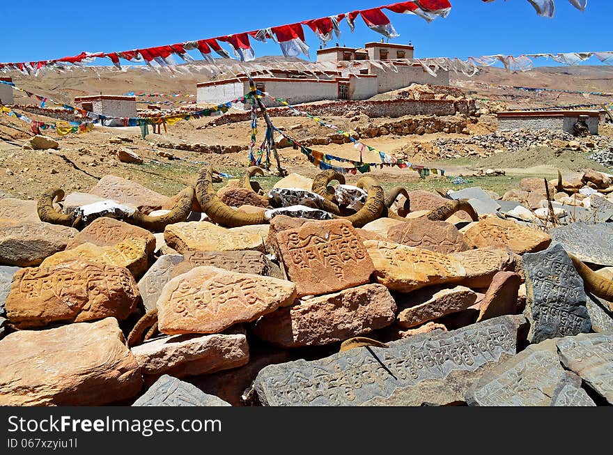 Tibet. In the Buddhist monastery on the rocks written prayers