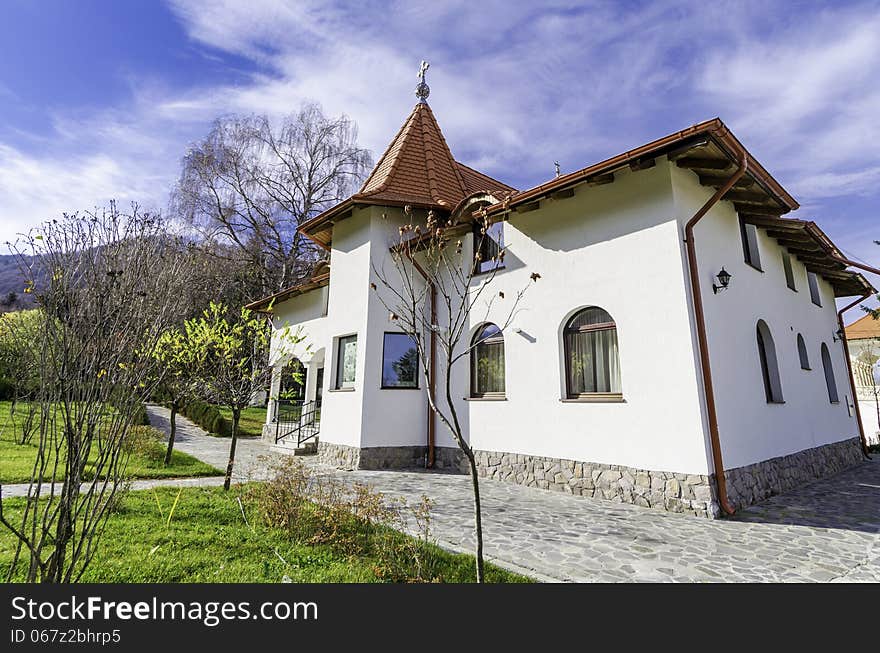 A small cottage in the Sambata Monastery resort - in the heart of Carpathian chain of mountains - a sunny autumn sunday right after the liturgy. A small cottage in the Sambata Monastery resort - in the heart of Carpathian chain of mountains - a sunny autumn sunday right after the liturgy