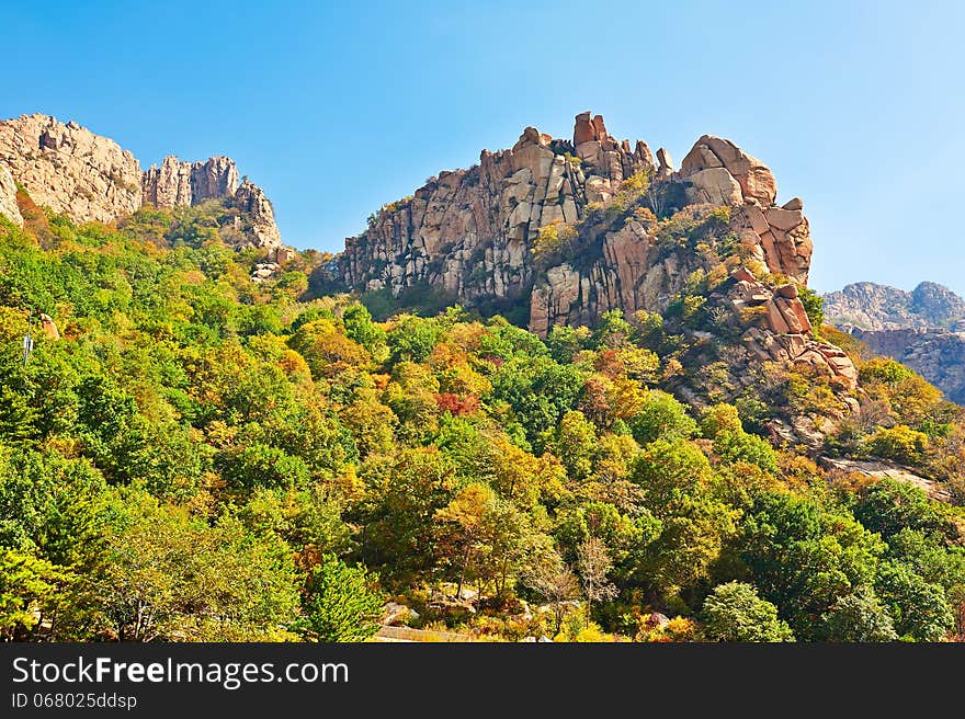 The Autumn Forest And Steep Peaks Of Zu Mountain