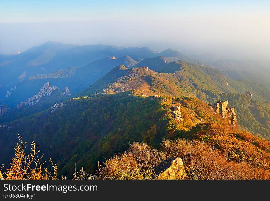 The photo taken in Chinas Hebei province qinhuangdao city,Zu mountain scenic spot.The time is October 3, 2013.Overlook hills from the Apsara peak of Zu mountain. The photo taken in Chinas Hebei province qinhuangdao city,Zu mountain scenic spot.The time is October 3, 2013.Overlook hills from the Apsara peak of Zu mountain.