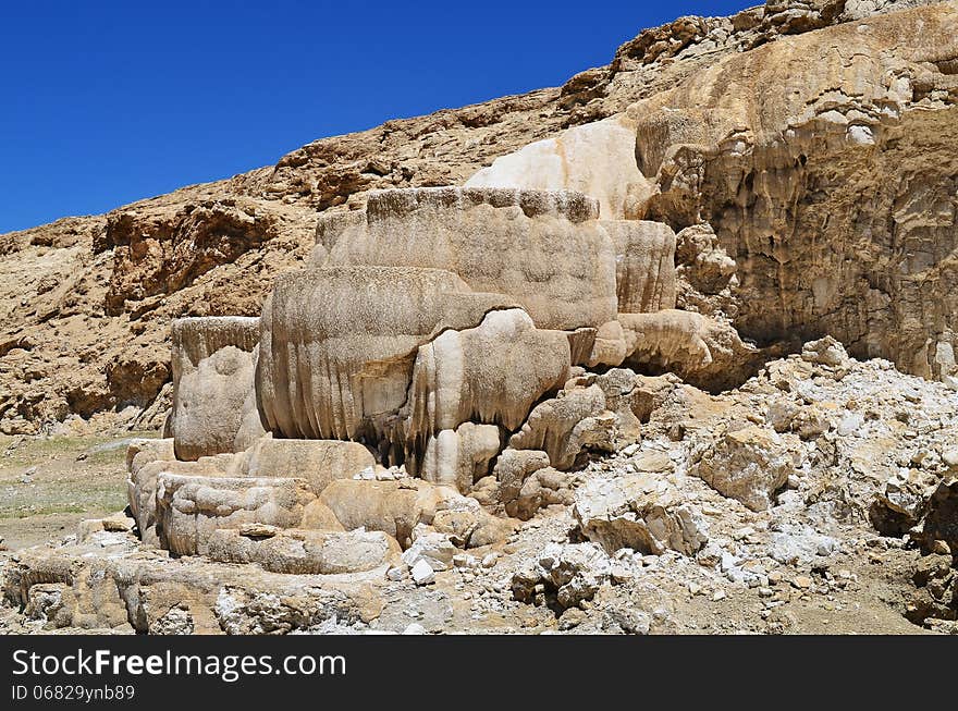 Tibet. Hot spring bath formed from limestone .