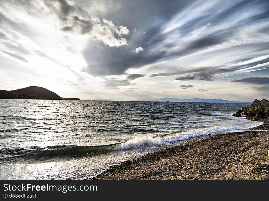 Sea landscape in the light of the evening sun