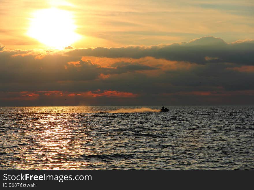 This guy is a die hard water craft lover that's for sure. He's using every last bit of daylight before pulling that jet ski out of the water. This guy is a die hard water craft lover that's for sure. He's using every last bit of daylight before pulling that jet ski out of the water.