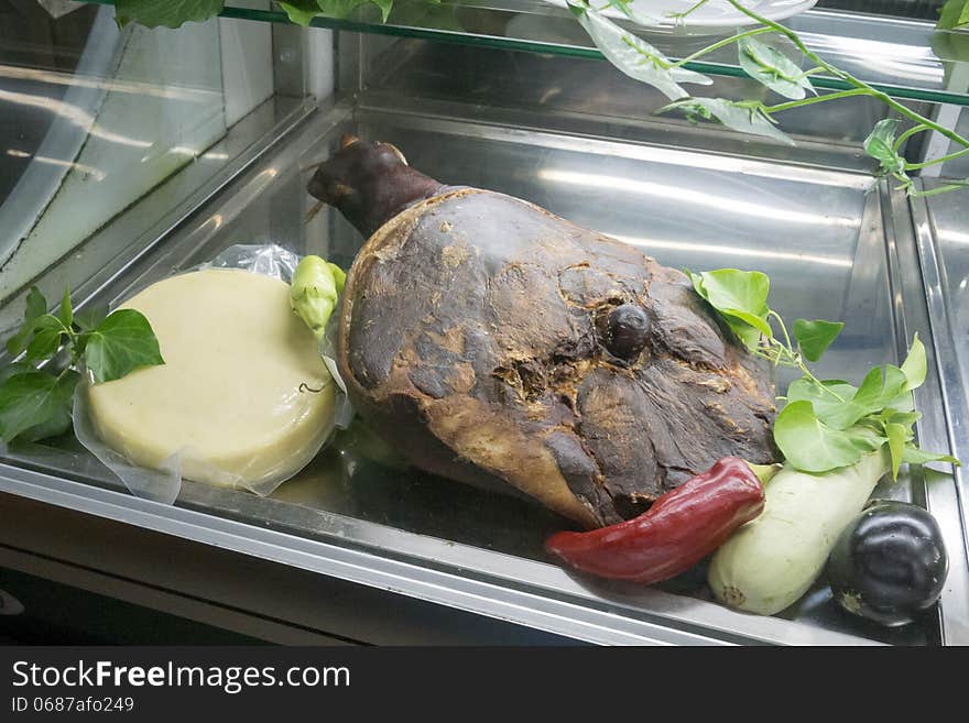 Ham, cheese and fresh vegetables on food counter. Ham, cheese and fresh vegetables on food counter