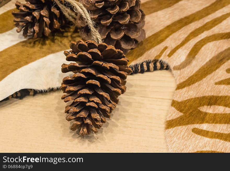 Pines Cones on Light Brown Zebra Print Hide. Pines Cones on Light Brown Zebra Print Hide