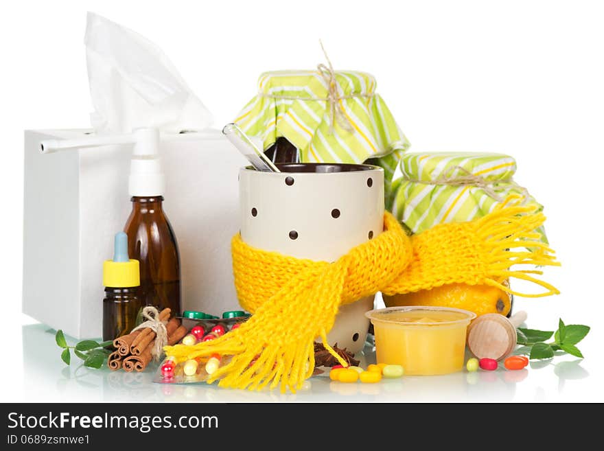 Different cold medicines on a white background