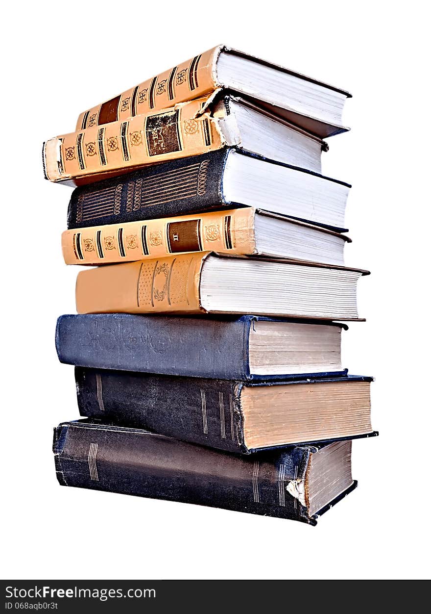 Stack of aged books isolated on white. Stack of aged books isolated on white.