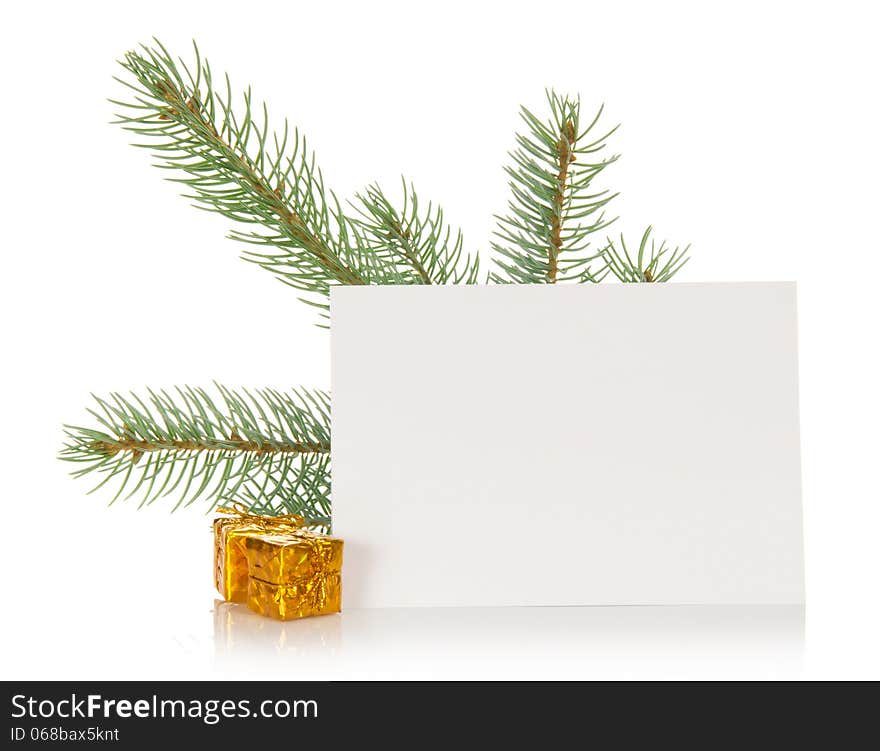 Fir-tree branch, small gift boxes and the empty