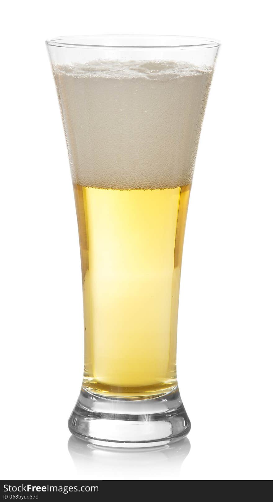 Glass of light beer isolated on white