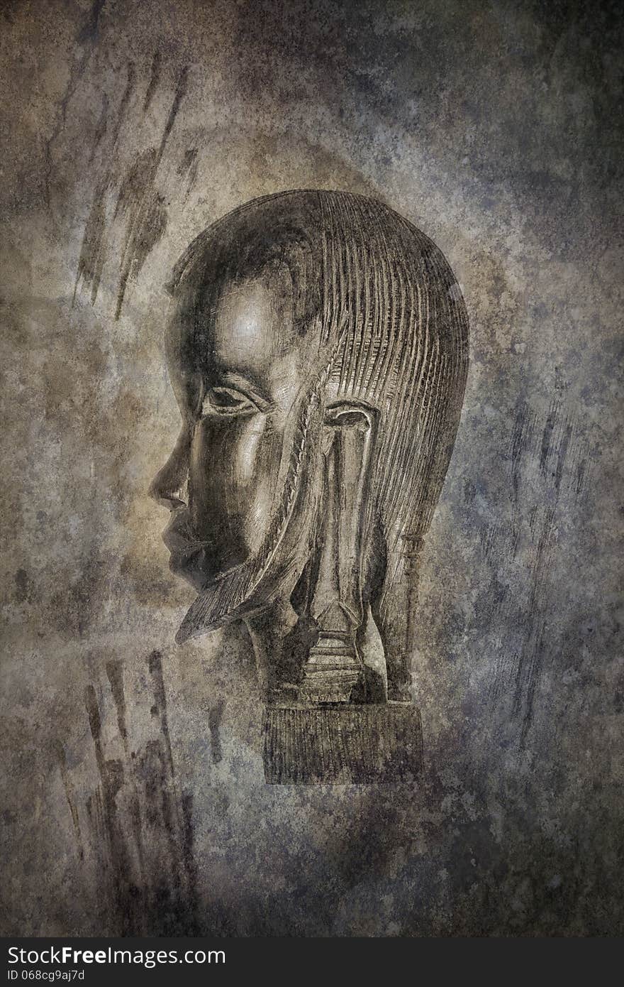 African carved head idol against a grunge textured background of primitive, ghostly cave painting hand prints. African carved head idol against a grunge textured background of primitive, ghostly cave painting hand prints.