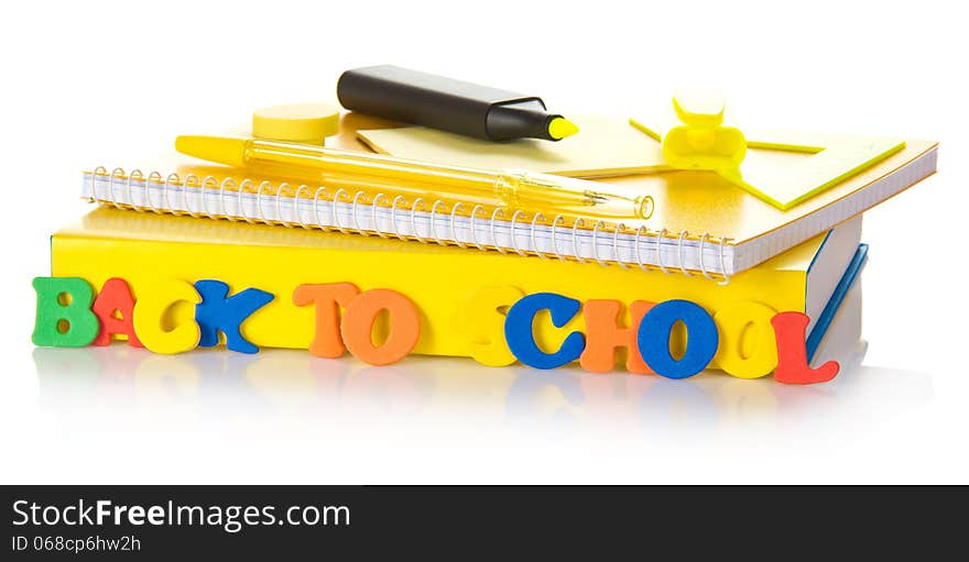 Back to school. The book, exercise book and the felt pen, isolated on white