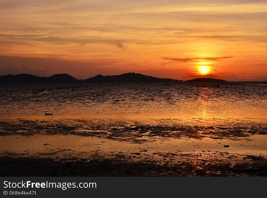 A sunset scene in Songkhla, Thailand.